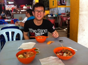 my couchsurf host and our Laksa breakfast