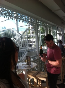 James mischievously pouring some champagne at the Regatta 
